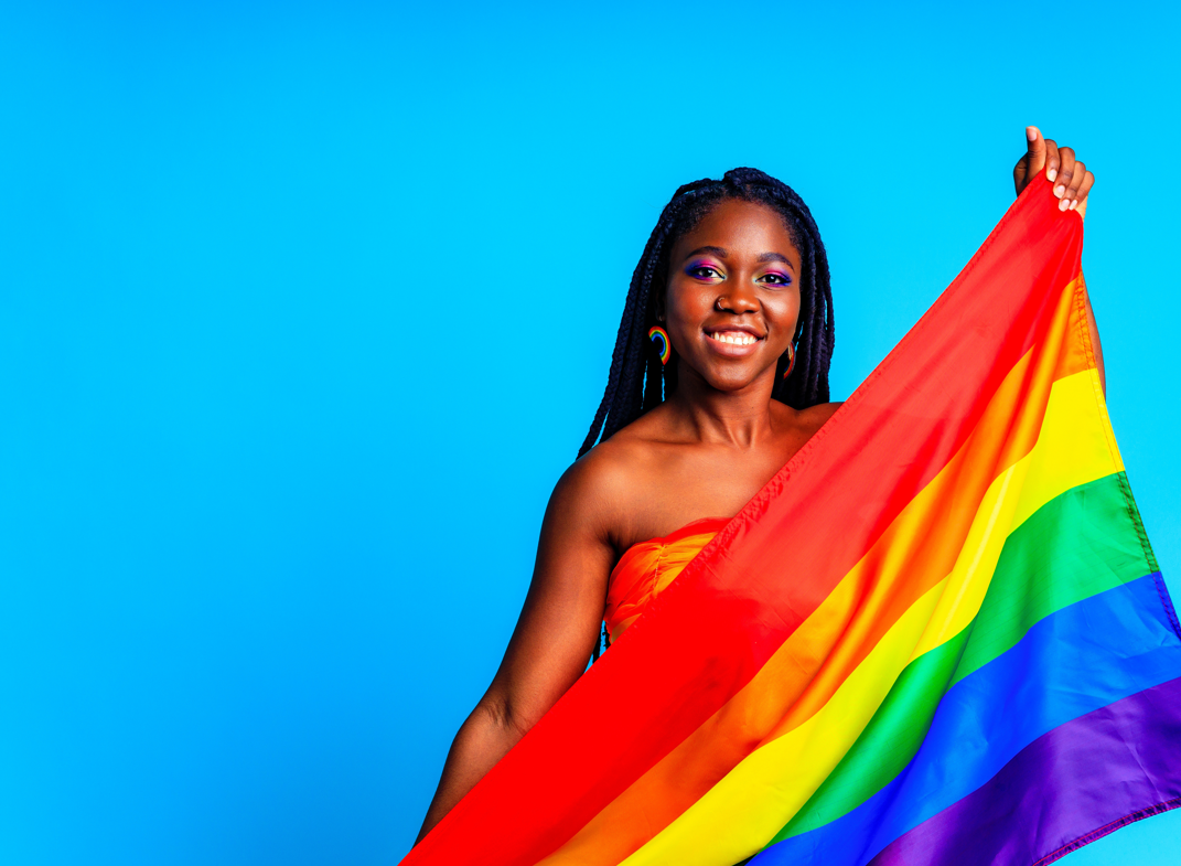 Women holding pride flag