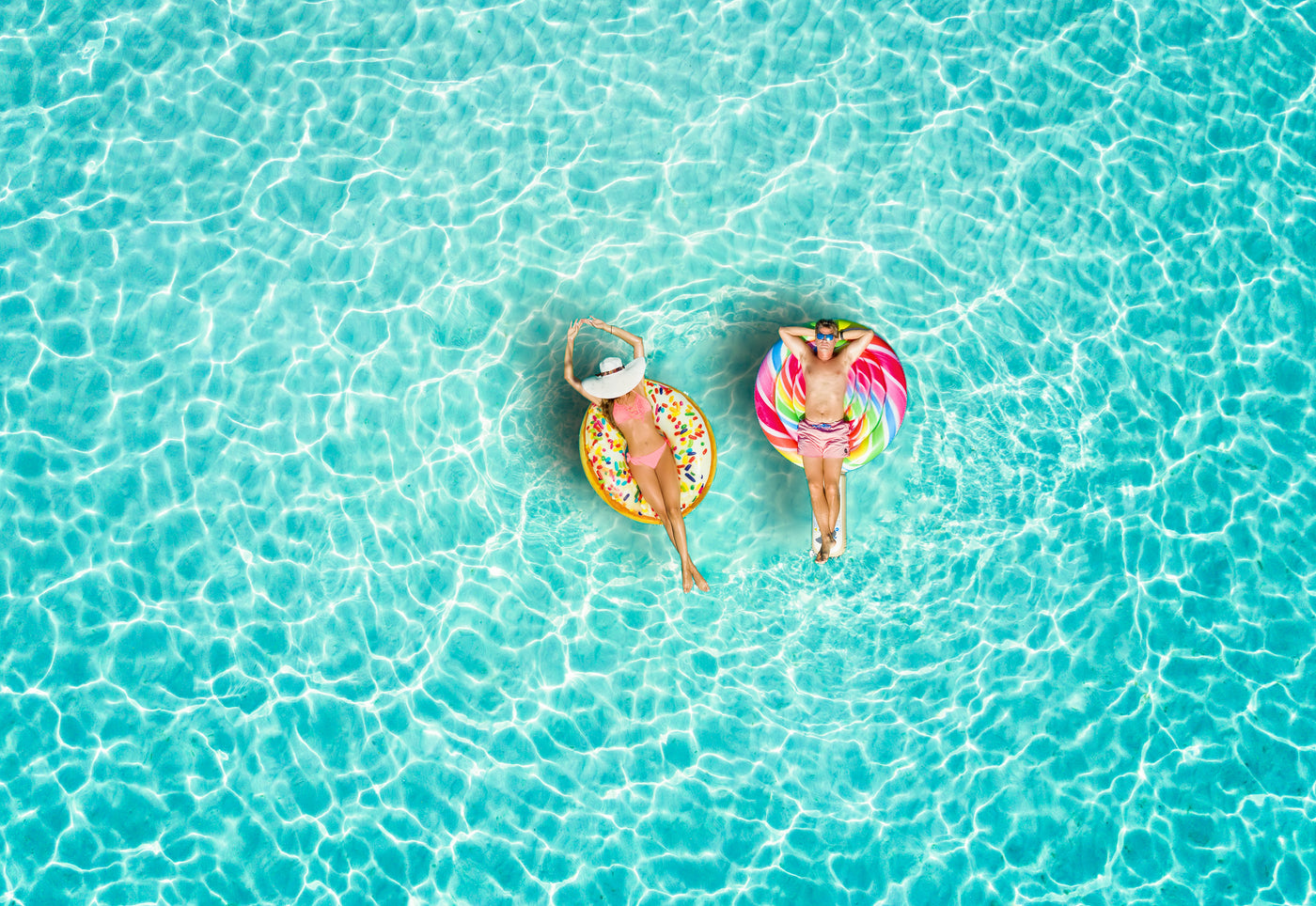  Couple floating in a pool