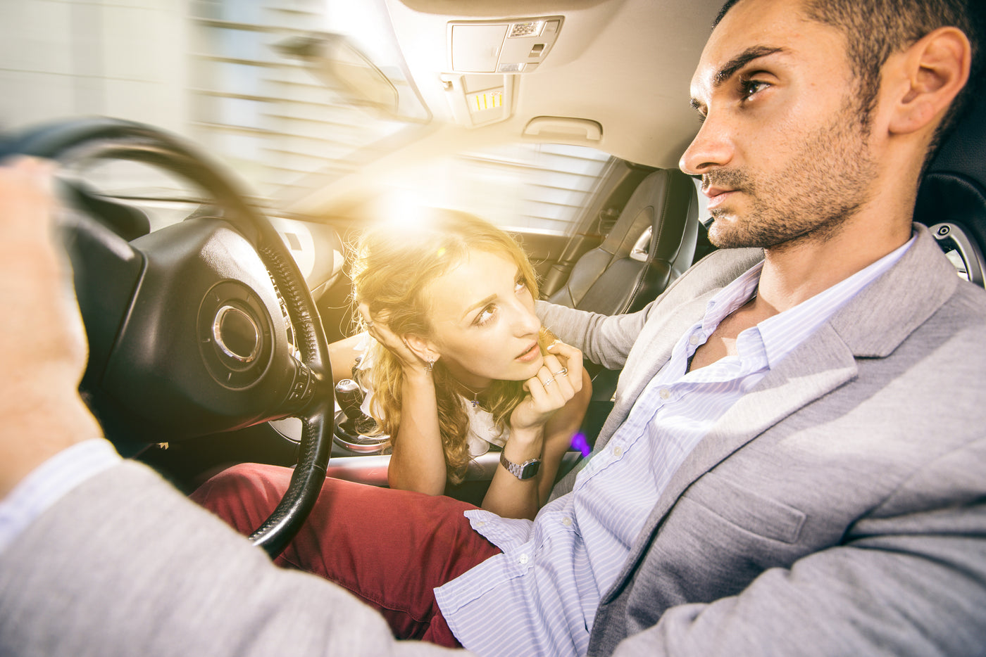Couple driving car 