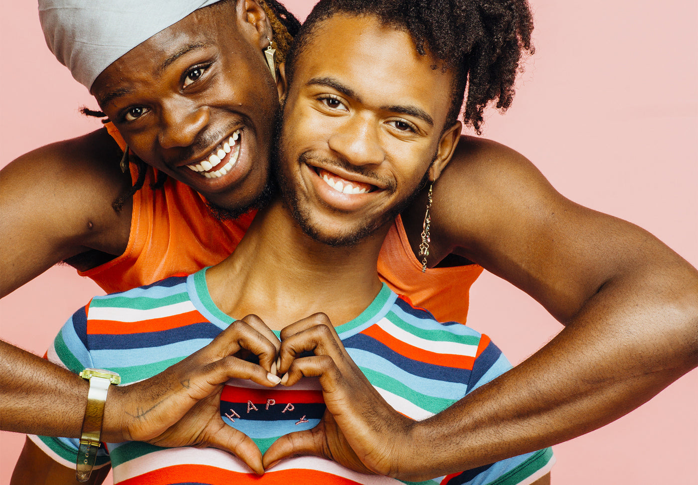 Gay Couple Hands Shaping A Heart Symbol
