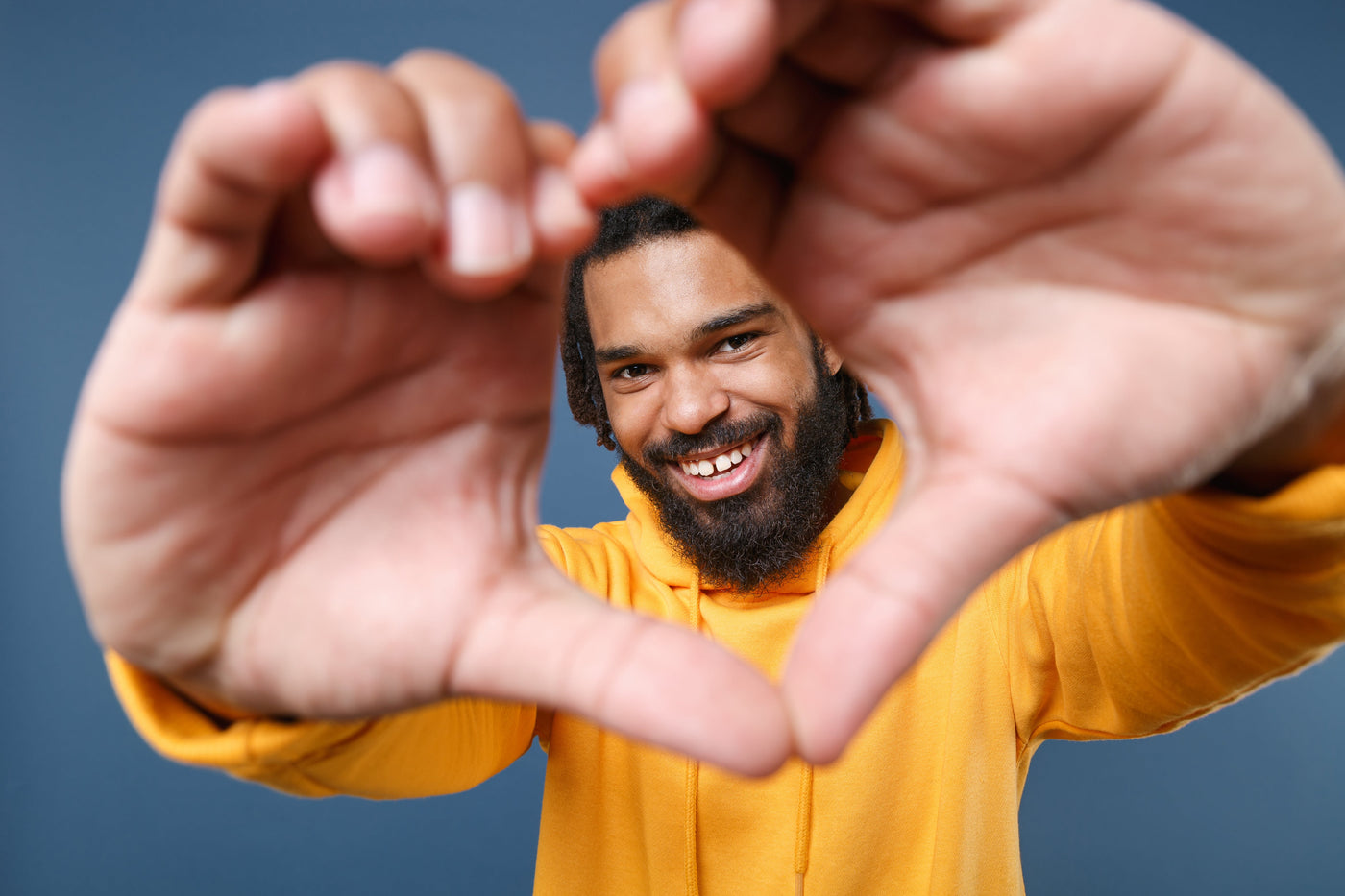 Man Hands Shaping A Heart Symbol